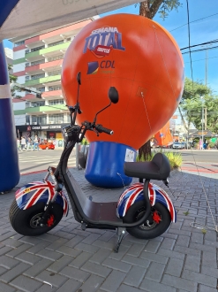 MB Comunica��o Empresarial e Organizacional - CDL exp�s na avenida um dos principais pr�mios que ser� sorteado em setembro: uma mini scooter el�trica